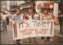 Men with It's Time banner for National Gay Task Force at gay pride parade