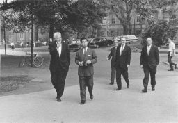 Japanese Royal Family's informal visit to the Penn campus: President Gaylord P. Harnwell walks across College Hall green with Prince Mikasa