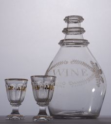 Flint glass wine decanter and cordial glasses.