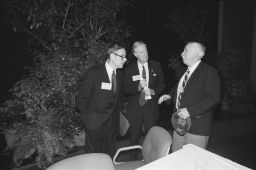 Stephen H. Weiss, president Frank H.T. Rhodes, and Walter Lynn talking to each other