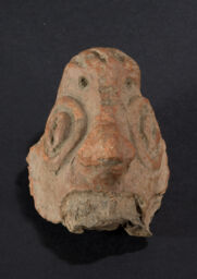 Lug with combined anthropomorphic and zoomorphic features 