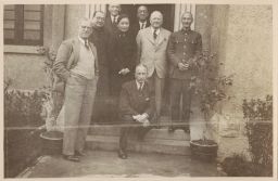 Photograph of James M. McHugh with various dignitaries.