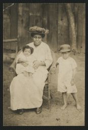 Portrait of woman and two children