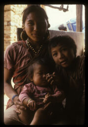 ama nanihaaru kakhama liyera  baseki chori (लमो (पिक्कूस्य्या) नानीहरु काँखमा लिएर बसेकी छोरी / mother Sitting With Her Children on Her Lap)