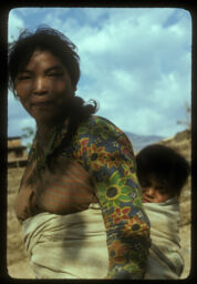 Serkul (Lelesya) chora pithiyuma bui gareki (सेरकुल(लेलेस्या) छोरी पिठ्युमा बुई गरेकी / Serkul (Lelesya) Carrying her Son on Her Back)