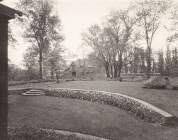 A. D. White House garden with Big Red Barn and Bailey Auditorium at back