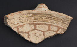 Large base and body fragment from a concentric dish with a flaring annular foot