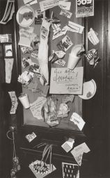 Archie Ammons's Goldwin Smith Hall office door, decorated with garbage