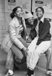 Tony Tone and two unidentified women at South Bronx High School