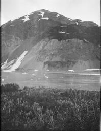 Osier Island camp on nose of Gilbert Point Butler rowing from Osier Island