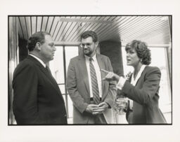 Weil, Hogan, and Forsberg attending the Weinberger reception, 1986
