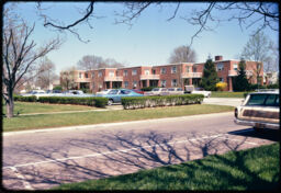 Apartment complex and parking area from the street (Greenhills, Ohio, USA)