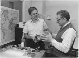 Portrait of Simpson (Sam) Linke, Cornell Professor of Electrical Engineering with unidentified student