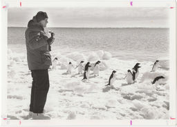 Frank H. T. Rhodes with penguins
