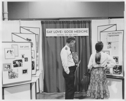 Man and woman at the National Gay Task Force's display at the 1973 APA Convention