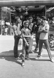Group of five men at street festival, Third Ave. Hub, Bronx