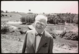 Newman with arboretum behind (close up)