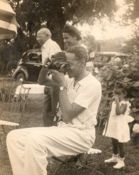 Raymond Pace Alexander (1897-1974), B.S. in Econ. 1920, with camera