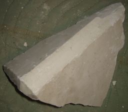Plinth fragment with beveled edge