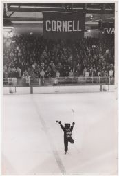 Cornell University's mascot skating at center ice