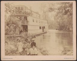 Steamship with children on shore in foreground
